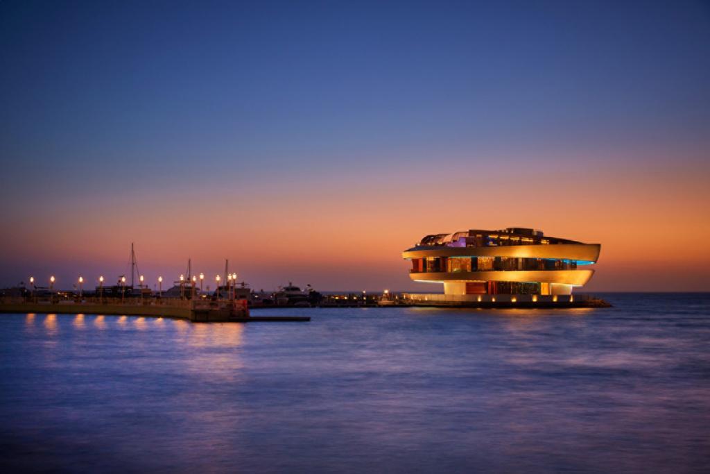 Four Seasons Hotel Doha Exterior foto The casino at night